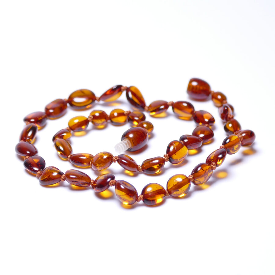 Baltic amber baby necklace with bean-shaped beads in cognac color - Wholesale price