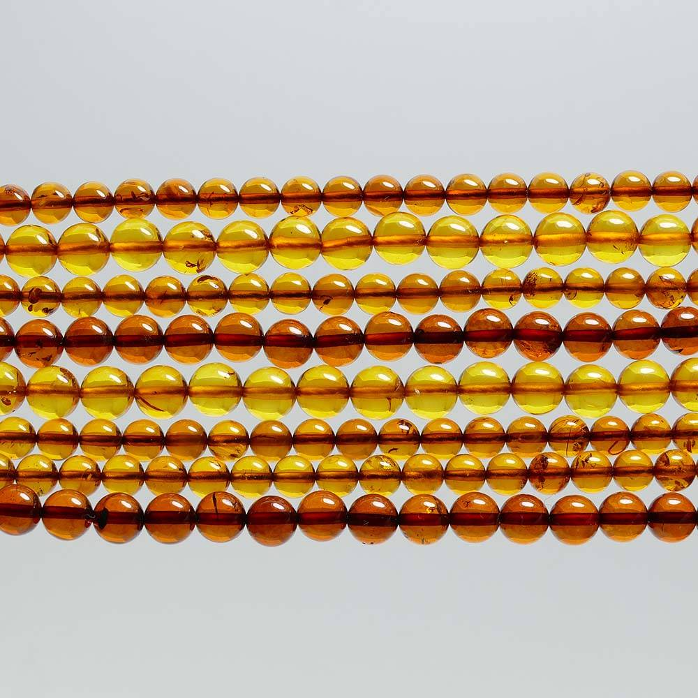 Wholesale loose amber bead strands
